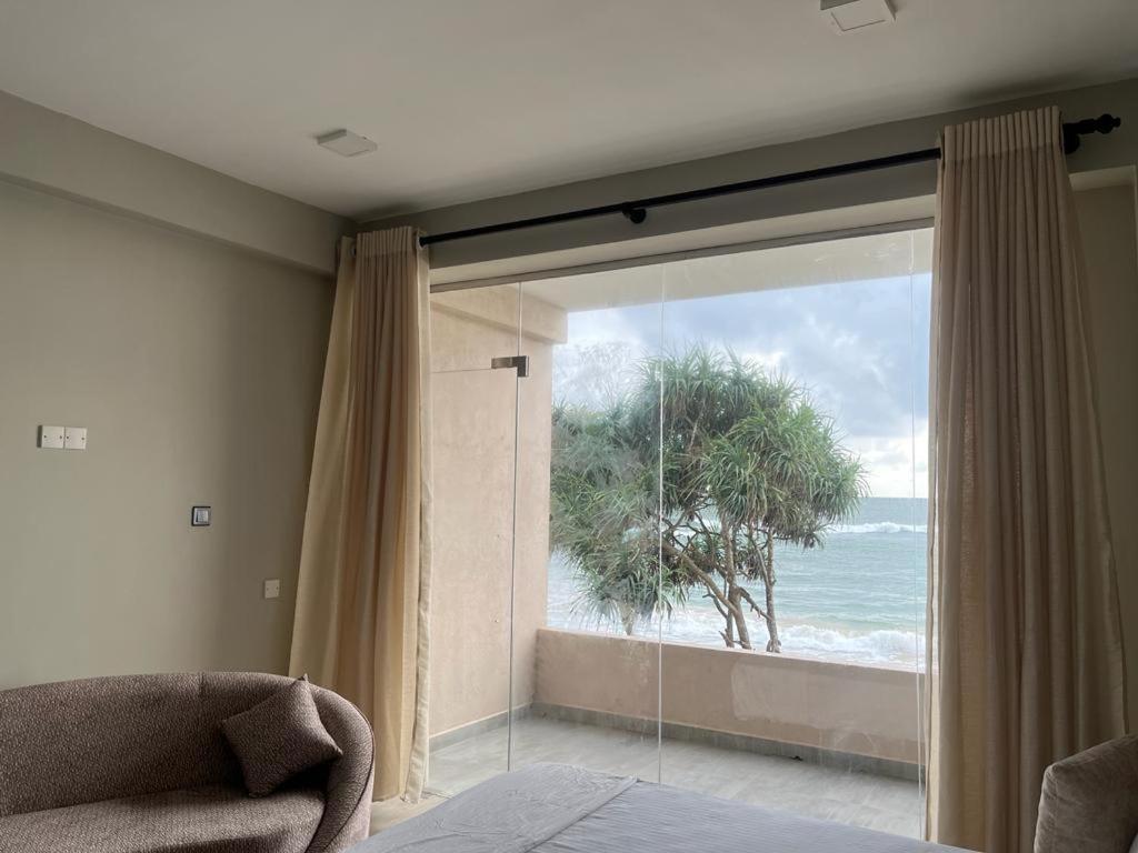 Sevenra Grand Beach Hotel أمبالانغودا المظهر الخارجي الصورة