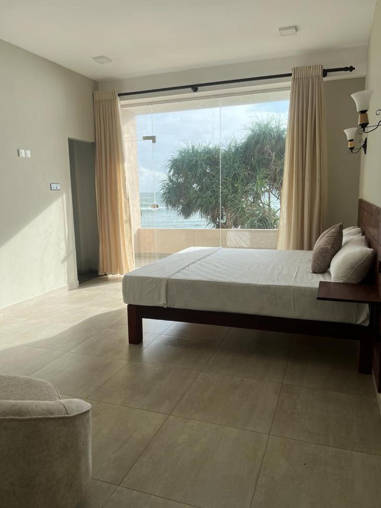 Sevenra Grand Beach Hotel أمبالانغودا المظهر الخارجي الصورة